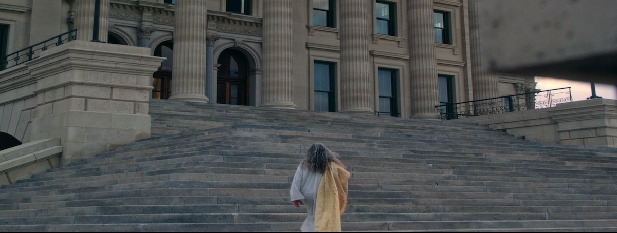 Jesus walking into the Kansas State Capitol to observe the Supreme Court abortion case