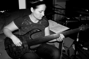 Cassie Campbell, my producer for the project playing her fretless bass on my song “Something to Live For, Something to Die For”