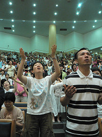 Koreans Worshiping During IHOP's Conference